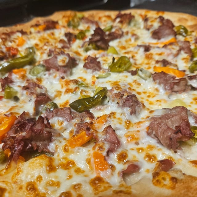 Small Philly Cheese Steak Pizza.